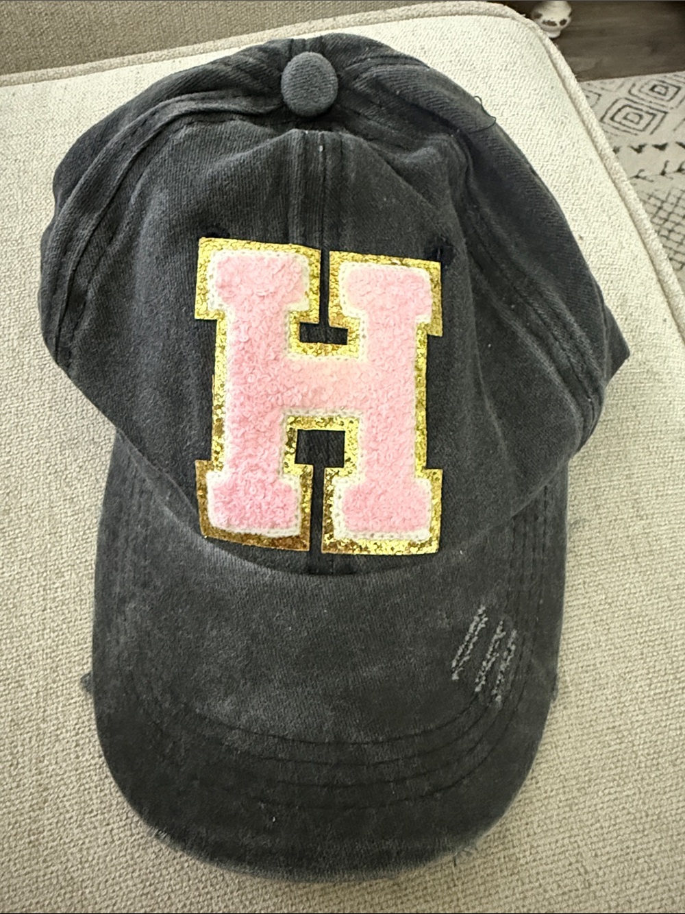 Black Baseball Cap with Pink 'H' Patch